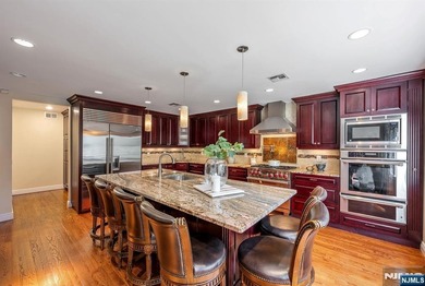 Set on a private and beautifully landscaped .8-acre property - photo 10