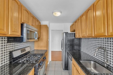 MOST DESIREABLE RARE TO THE MARKET CORNER RENOVATED TWO BEDROOM