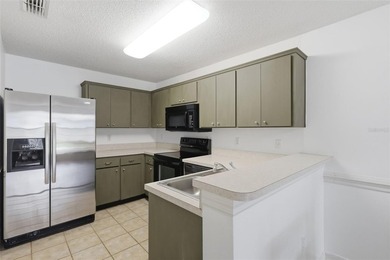 Welcome to this charming 2 bedroom, 2 bath villa located in the - photo 12