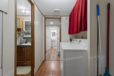 Welcome to this beautifully maintained 3-bedroom, 2-bathroom