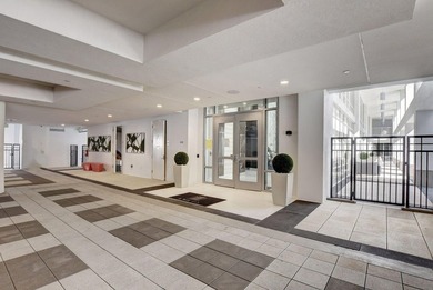 Experience refined townhouse-style living in the heart of - photo 4