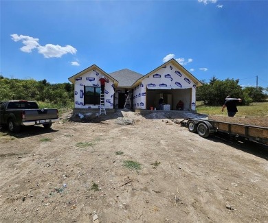 Lake Home For Sale in Runaway Bay, Texas