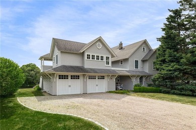 Perched at the water's edge, 19 Teal Drive is a custom-built - photo 8
