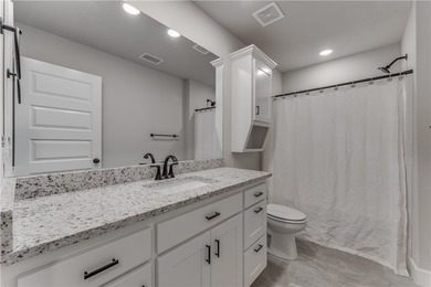 This versatile 3-bedroom PLUS bonus room home features a - photo 15