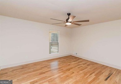 HUGE PRICE REDUCTION! LAKE HOME WITH 200 FEET OF SHORE LINE ON A - photo 20