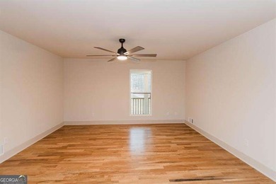 HUGE PRICE REDUCTION! LAKE HOME WITH 200 FEET OF SHORE LINE ON A - photo 22