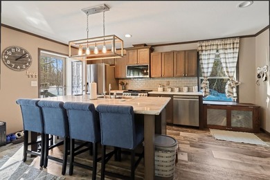 Discover easy peaceful Northwoods living in this well-kept - photo 3