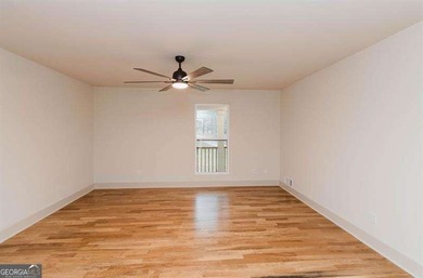 HUGE PRICE REDUCTION! LAKE HOME WITH 200 FEET OF SHORE LINE ON A - photo 24
