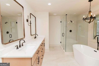 HUGE PRICE REDUCTION! LAKE HOME WITH 200 FEET OF SHORE LINE ON A - photo 26