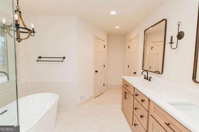 HUGE PRICE REDUCTION! LAKE HOME WITH 200 FEET OF SHORE LINE ON A - photo 28