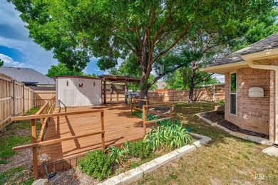 This beautiful, 4-bedroom brick home offers numerous updates and - photo 32
