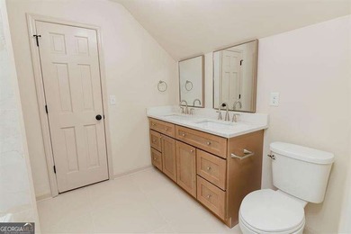 HUGE PRICE REDUCTION! LAKE HOME WITH 200 FEET OF SHORE LINE ON A - photo 35