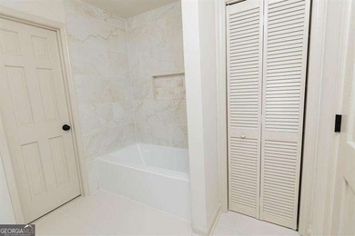 HUGE PRICE REDUCTION! LAKE HOME WITH 200 FEET OF SHORE LINE ON A - photo 36