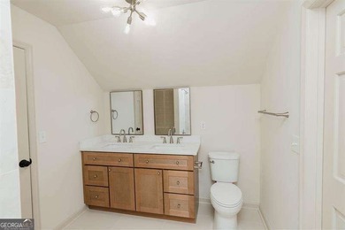 HUGE PRICE REDUCTION! LAKE HOME WITH 200 FEET OF SHORE LINE ON A - photo 37