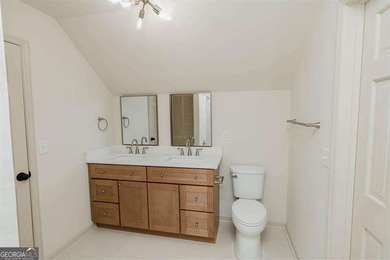 HUGE PRICE REDUCTION! LAKE HOME WITH 200 FEET OF SHORE LINE ON A - photo 38