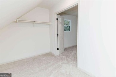 HUGE PRICE REDUCTION! LAKE HOME WITH 200 FEET OF SHORE LINE ON A - photo 44