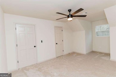 HUGE PRICE REDUCTION! LAKE HOME WITH 200 FEET OF SHORE LINE ON A - photo 45