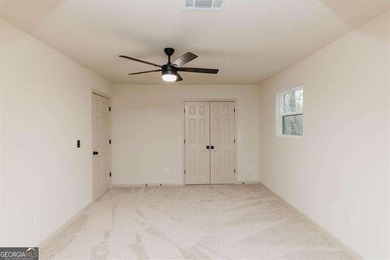 HUGE PRICE REDUCTION! LAKE HOME WITH 200 FEET OF SHORE LINE ON A - photo 46