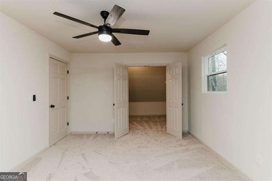 HUGE PRICE REDUCTION! LAKE HOME WITH 200 FEET OF SHORE LINE ON A - photo 48
