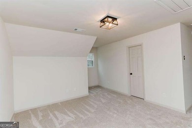 HUGE PRICE REDUCTION! LAKE HOME WITH 200 FEET OF SHORE LINE ON A - photo 49