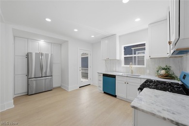 Classic architecture meets modern living in this beautifully - photo 5