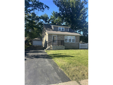Like no other!!! This *Custom* Stunning brick Cape Cod 3 bedroom - photo 2