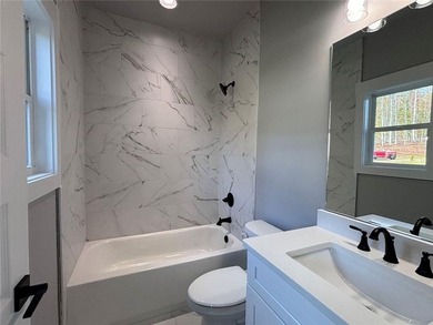 **Stunning New Construction with Owners Suite on Main & Outdoor