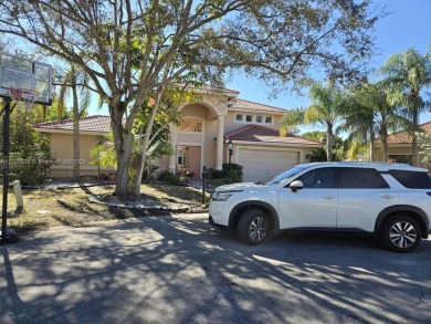 Lake Home For Sale in Coral Springs, Florida