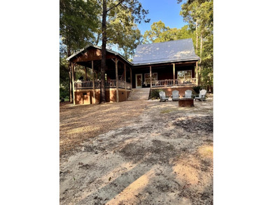 Welcome to your dream lake retreat at 61 Estate Drive in Fort - photo 2
