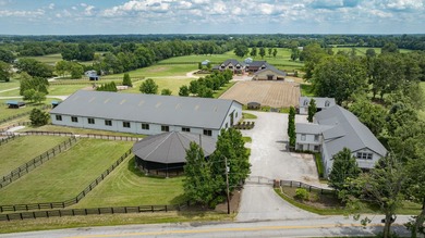 Spectacular equestrian estate nestled on 66 gorgeous acres on - photo 2