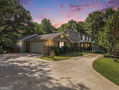 This sprawling lake estate featuring six bedrooms and five baths - photo 1