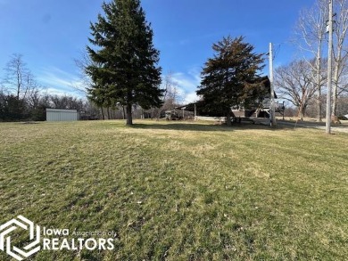 Seize the opportunity to own a stunning bare lot in the serene - Lake Lot Sale Pending in Brooklyn, Iowa