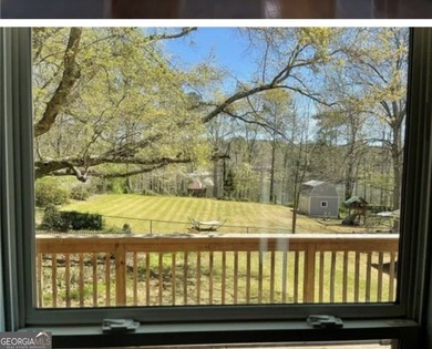 This sprawling lake estate featuring six bedrooms and five baths - photo 3