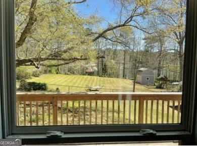 This sprawling lake estate featuring six bedrooms and five baths - photo 5