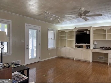 This sprawling lake estate featuring six bedrooms and five baths - photo 6