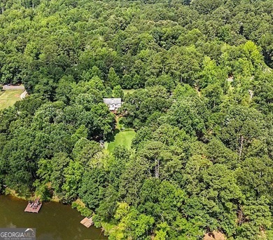 This sprawling lake estate featuring six bedrooms and five baths - photo 7