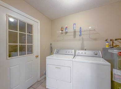 BRICK BEAUTY ON 0.5 ACRES! Welcome home to this charming - photo 9