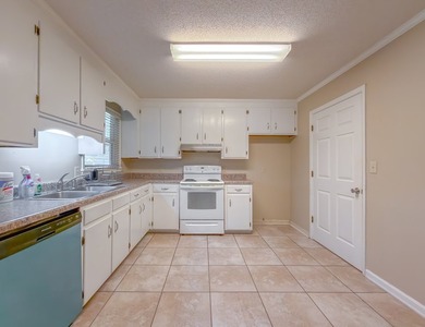 BRICK BEAUTY ON 0.5 ACRES! Welcome home to this charming - photo 10