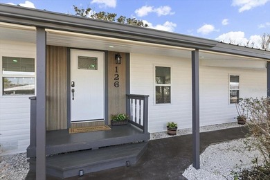Beautifully remodeled lakefront 3-bedroom 2 bathroom home with - photo 2