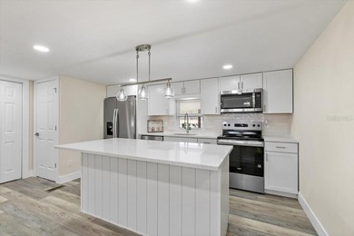 Beautifully remodeled lakefront 3-bedroom 2 bathroom home with - photo 5