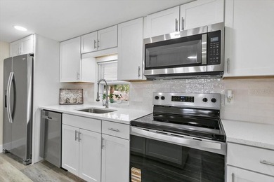 Beautifully remodeled lakefront 3-bedroom 2 bathroom home with - photo 6