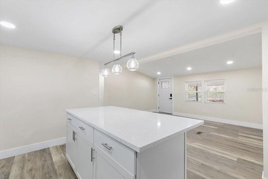 Beautifully remodeled lakefront 3-bedroom 2 bathroom home with - photo 7
