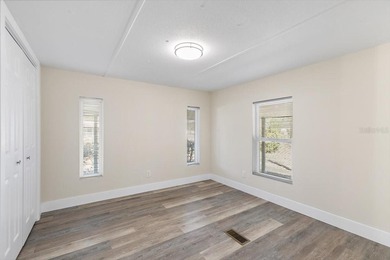 Beautifully remodeled lakefront 3-bedroom 2 bathroom home with - photo 8