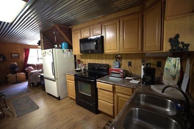 Welcome to this super cozy, cabin feeling, A-frame sitting at - photo 11