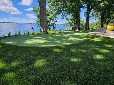 Sitting upon perhaps the highest perch of West Lake Okoboji, the - photo 12