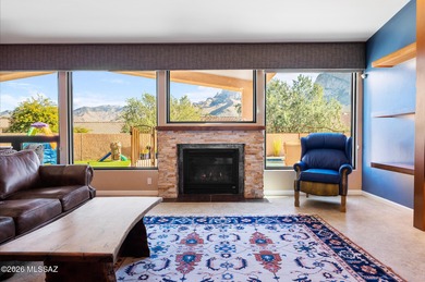 Perched atop a scenic hill in the prestigious Oro Valley Heights