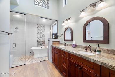 Perched atop a scenic hill in the prestigious Oro Valley Heights