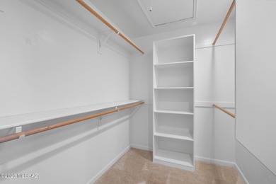 Perched atop a scenic hill in the prestigious Oro Valley Heights