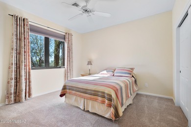 Perched atop a scenic hill in the prestigious Oro Valley Heights