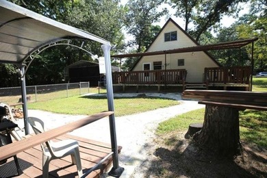 Welcome to this super cozy, cabin feeling, A-frame sitting at - photo 34
